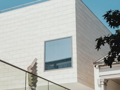closed-window white concrete house at daytime